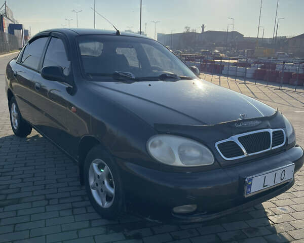 Черный Дэу Ланос, объемом двигателя 1.4 л и пробегом 177 тыс. км за 1750 $, фото 1 на Automoto.ua