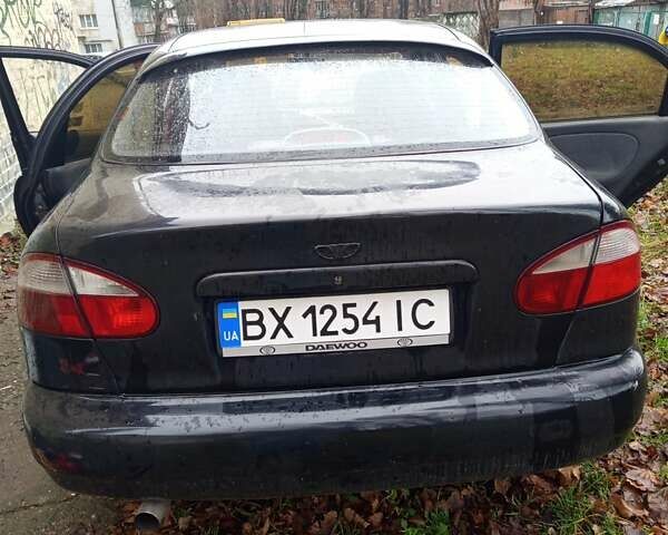 Черный Дэу Ланос, объемом двигателя 1.5 л и пробегом 180 тыс. км за 2300 $, фото 3 на Automoto.ua