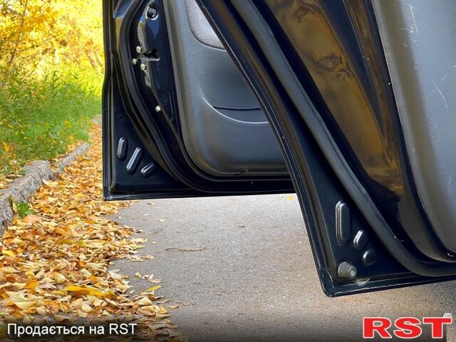 Дэу Ланос 2008 в Кривом Роге на Automoto.ua Черный Дэу Ланос, объемом двигателя 1.5 л и пробегом 105 тыс. км за 2700 $, фото 9 на Automoto.ua