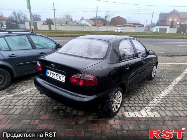 Черный Дэу Ланос, объемом двигателя 1.5 л и пробегом 220 тыс. км за 1000 $, фото 3 на Automoto.ua