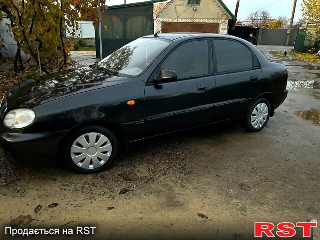 Черный Дэу Ланос, объемом двигателя 1.4 л и пробегом 220 тыс. км за 1800 $, фото 10 на Automoto.ua