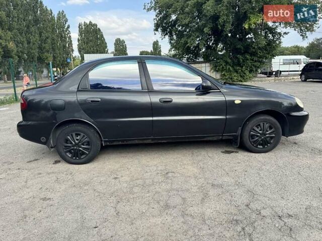 Черный Дэу Ланос, объемом двигателя 1.5 л и пробегом 274 тыс. км за 2250 $, фото 1 на Automoto.ua