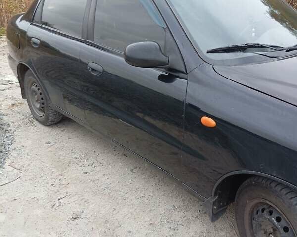 Черный Дэу Ланос, объемом двигателя 1.5 л и пробегом 250 тыс. км за 1700 $, фото 5 на Automoto.ua