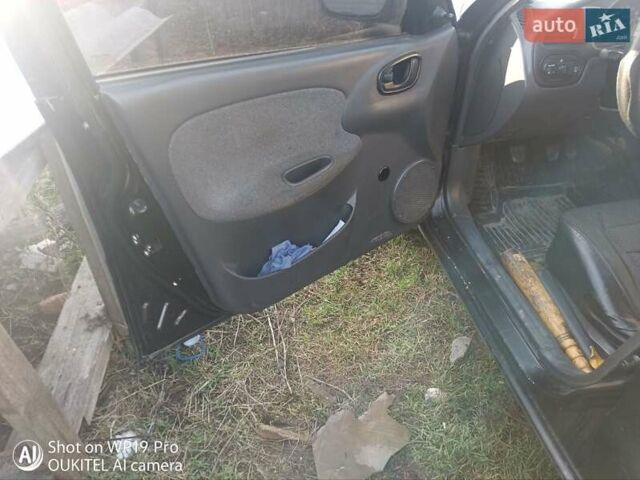 Чорний Деу Ланос, об'ємом двигуна 1.6 л та пробігом 355 тис. км за 2000 $, фото 26 на Automoto.ua