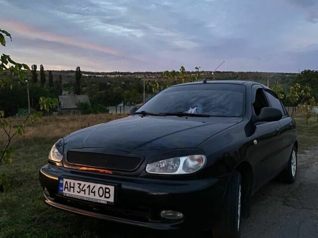 Черный Дэу Ланос, объемом двигателя 1.5 л и пробегом 1000 тыс. км за 2600 $, фото 1 на Automoto.ua
