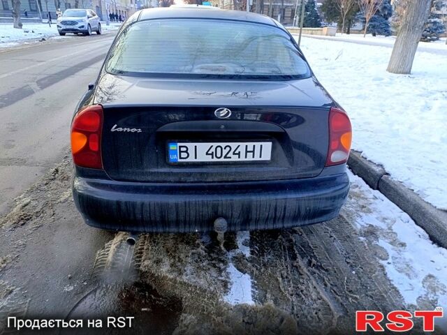 Черный Дэу Ланос, объемом двигателя 1.5 л и пробегом 190 тыс. км за 2550 $, фото 3 на Automoto.ua