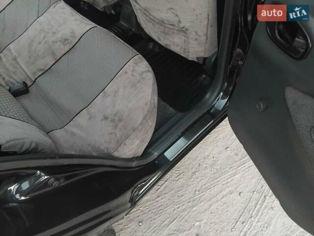 Чорний Деу Ланос, об'ємом двигуна 1.5 л та пробігом 193 тис. км за 3100 $, фото 9 на Automoto.ua