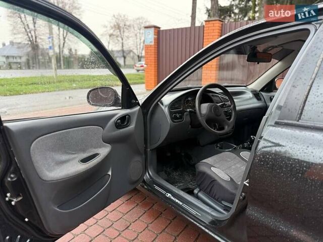 Черный Дэу Ланос, объемом двигателя 1.5 л и пробегом 225 тыс. км за 2999 $, фото 8 на Automoto.ua