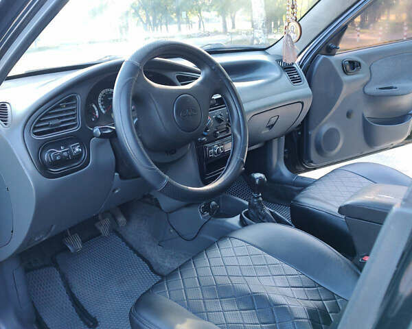 Черный Дэу Ланос, объемом двигателя 1.5 л и пробегом 160 тыс. км за 2500 $, фото 6 на Automoto.ua