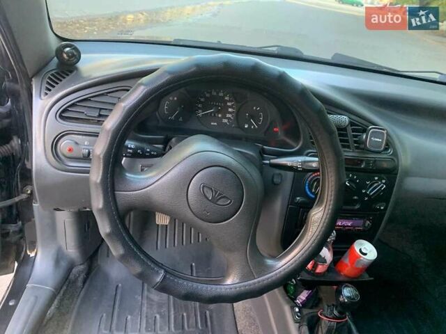 Чорний Деу Ланос, об'ємом двигуна 1.5 л та пробігом 245 тис. км за 3100 $, фото 6 на Automoto.ua