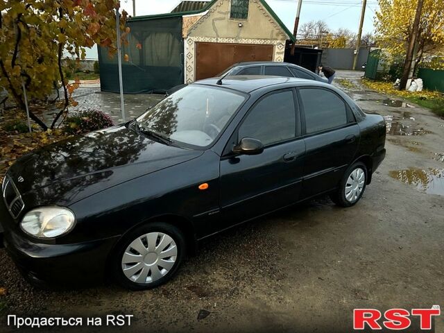 Черный Дэу Ланос, объемом двигателя 1.4 л и пробегом 220 тыс. км за 1800 $, фото 8 на Automoto.ua