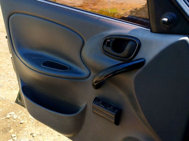 Черный Дэу Ланос, объемом двигателя 1.5 л и пробегом 240 тыс. км за 3300 $, фото 7 на Automoto.ua