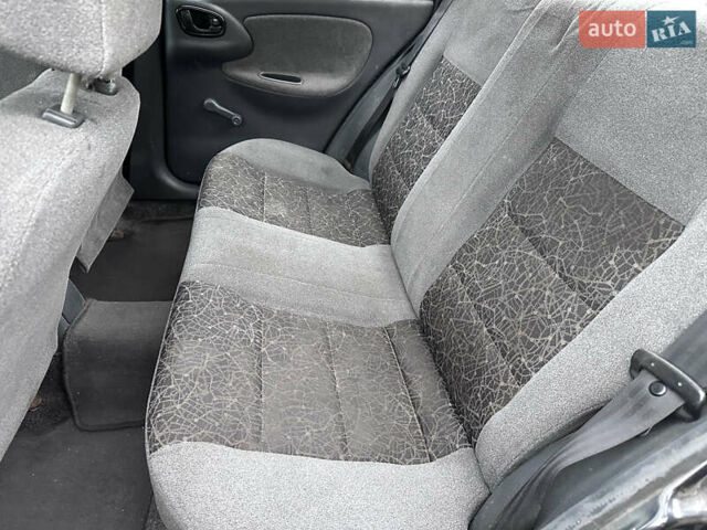 Черный Дэу Ланос, объемом двигателя 1.5 л и пробегом 267 тыс. км за 1499 $, фото 8 на Automoto.ua