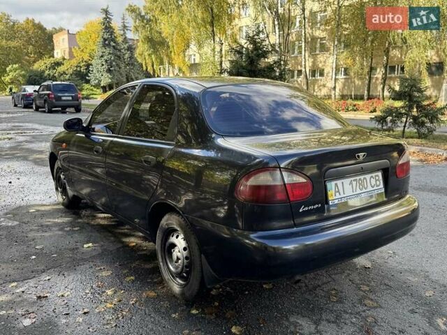 Черный Дэу Ланос, объемом двигателя 1.5 л и пробегом 164 тыс. км за 3000 $, фото 2 на Automoto.ua