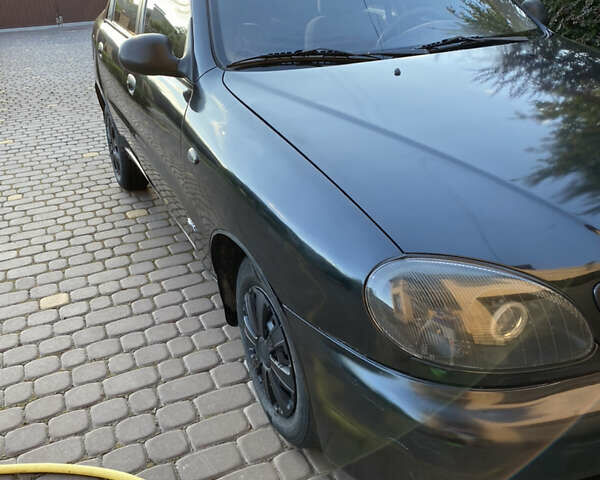 Черный Дэу Ланос, объемом двигателя 1.5 л и пробегом 416 тыс. км за 2500 $, фото 2 на Automoto.ua