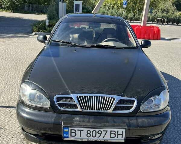 Деу Ланос 2008 у Полтаві на Automoto.ua Чорний Деу Ланос, об'ємом двигуна 1.5 л та пробігом 316 тис. км за 2600 $, фото 7 на Automoto.ua