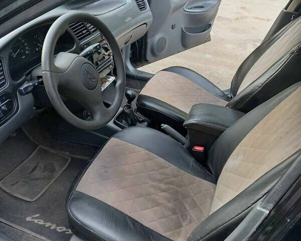 Чорний Деу Ланос, об'ємом двигуна 1.5 л та пробігом 300 тис. км за 3200 $, фото 11 на Automoto.ua