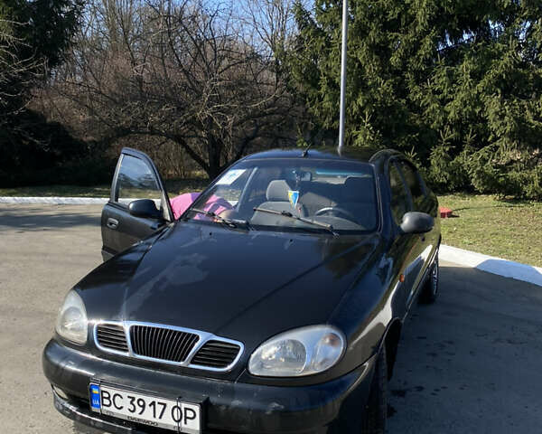 Черный Дэу Ланос, объемом двигателя 1.5 л и пробегом 204 тыс. км за 1800 $, фото 2 на Automoto.ua