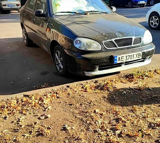 Черный Дэу Ланос, объемом двигателя 1.4 л и пробегом 0 тыс. км за 1300 $, фото 2 на Automoto.ua