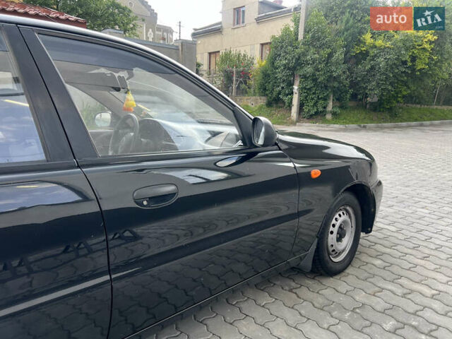 Черный Дэу Ланос, объемом двигателя 1.4 л и пробегом 78 тыс. км за 1850 $, фото 20 на Automoto.ua