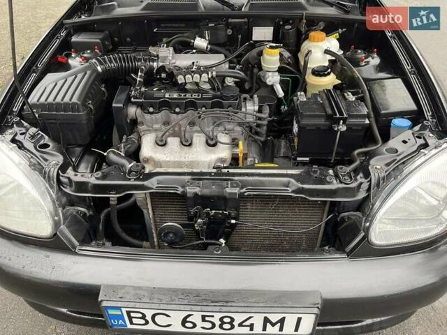 Чорний Деу Ланос, об'ємом двигуна 1.5 л та пробігом 167 тис. км за 2999 $, фото 17 на Automoto.ua