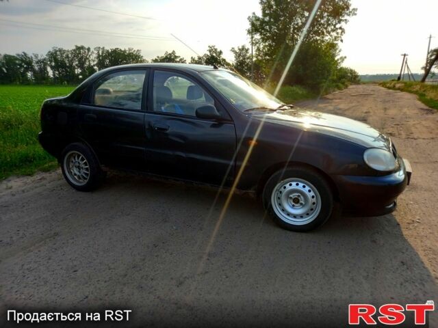 Черный Дэу Ланос, объемом двигателя 1.5 л и пробегом 368 тыс. км за 1150 $, фото 2 на Automoto.ua