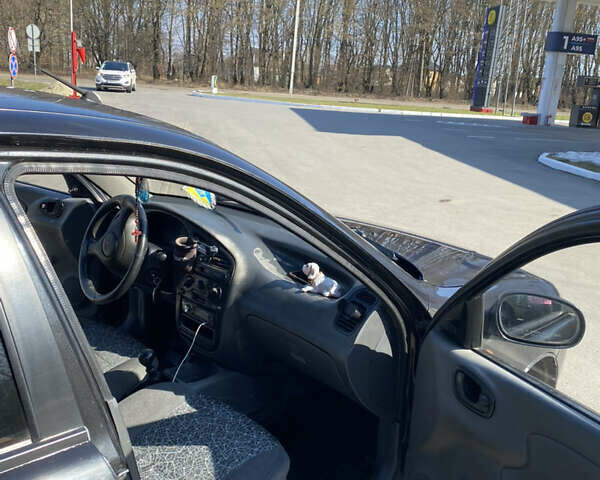 Дэу Ланос 2008 в Жидачов на Automoto.ua Черный Дэу Ланос, объемом двигателя 1.5 л и пробегом 204 тыс. км за 2000 $, фото 4 на Automoto.ua