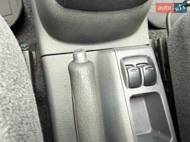 Черный Дэу Ланос, объемом двигателя 1.6 л и пробегом 156 тыс. км за 2400 $, фото 18 на Automoto.ua