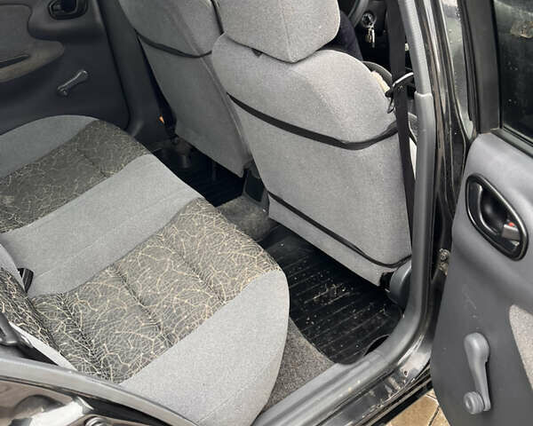Черный Дэу Ланос, объемом двигателя 1.5 л и пробегом 130 тыс. км за 2300 $, фото 13 на Automoto.ua