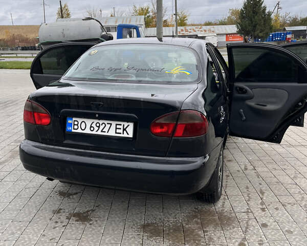 Черный Дэу Ланос, объемом двигателя 1.5 л и пробегом 130 тыс. км за 2300 $, фото 5 на Automoto.ua