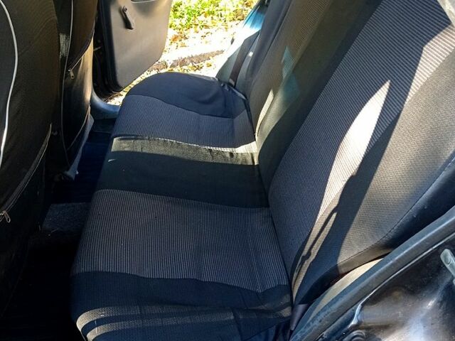 Черный Дэу Ланос, объемом двигателя 1.5 л и пробегом 365 тыс. км за 2000 $, фото 7 на Automoto.ua