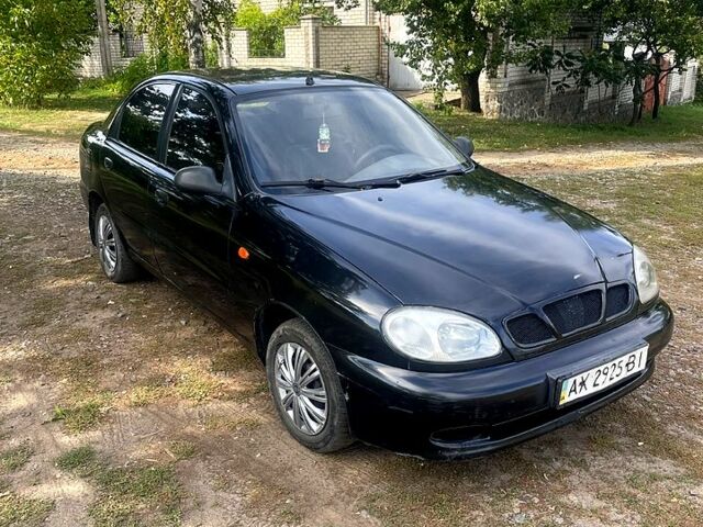 Чорний Деу Ланос, об'ємом двигуна 1.6 л та пробігом 158 тис. км за 1380 $, фото 1 на Automoto.ua