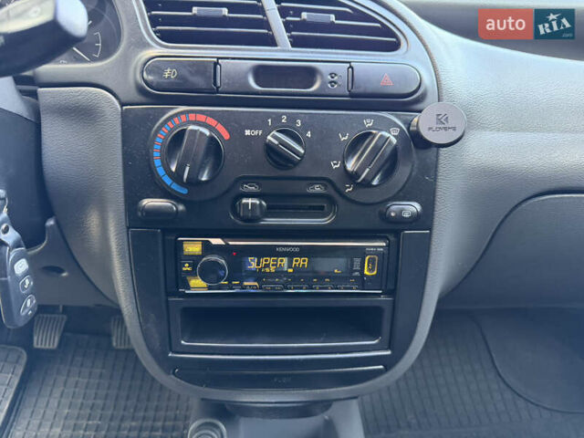 Черный Дэу Ланос, объемом двигателя 1.5 л и пробегом 100 тыс. км за 2900 $, фото 20 на Automoto.ua