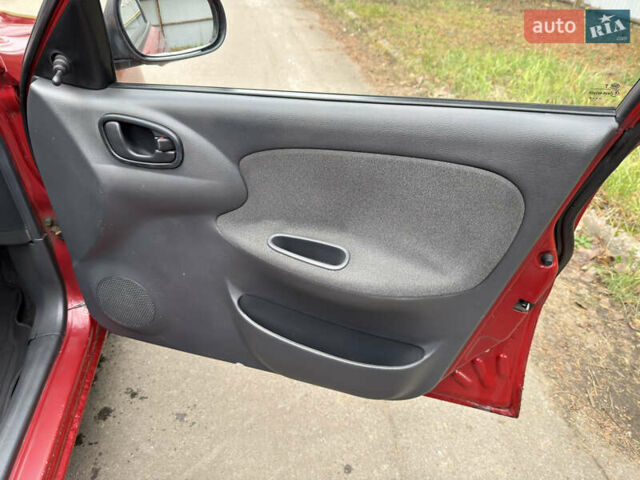 Черный Дэу Ланос, объемом двигателя 1.6 л и пробегом 156 тыс. км за 2400 $, фото 9 на Automoto.ua