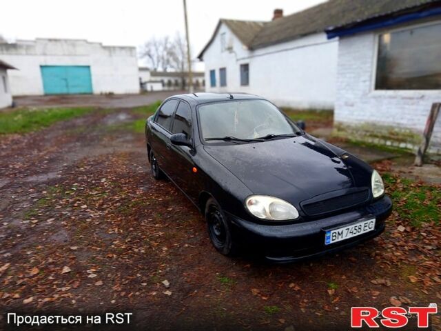 Чорний Деу Ланос, об'ємом двигуна 1.4 л та пробігом 150 тис. км за 1300 $, фото 2 на Automoto.ua