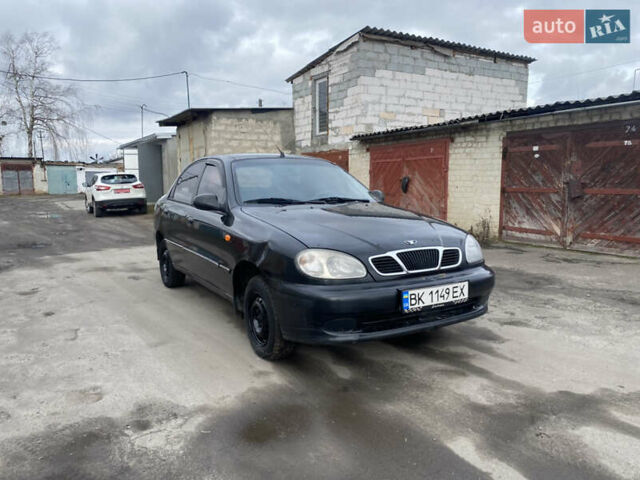 Чорний Деу Ланос, об'ємом двигуна 1.4 л та пробігом 180 тис. км за 1800 $, фото 4 на Automoto.ua