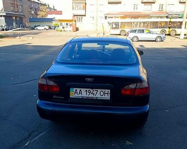 Черный Дэу Ланос, объемом двигателя 1.5 л и пробегом 365 тыс. км за 2000 $, фото 1 на Automoto.ua