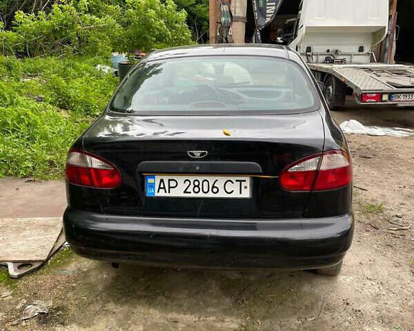 Черный Дэу Ланос, объемом двигателя 0 л и пробегом 250 тыс. км за 2000 $, фото 3 на Automoto.ua