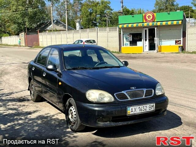 Чорний Деу Ланос, об'ємом двигуна 1.5 л та пробігом 150 тис. км за 1150 $, фото 1 на Automoto.ua
