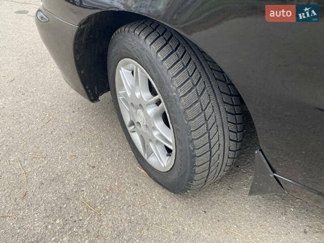 Черный Дэу Ланос, объемом двигателя 1.5 л и пробегом 231 тыс. км за 2900 $, фото 8 на Automoto.ua