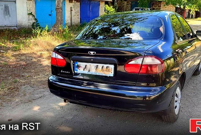 Черный Дэу Ланос, объемом двигателя 1.6 л и пробегом 104 тыс. км за 3000 $, фото 7 на Automoto.ua