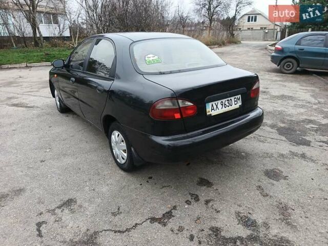 Черный Дэу Ланос, объемом двигателя 1.5 л и пробегом 240 тыс. км за 1800 $, фото 6 на Automoto.ua