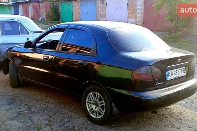 Черный Дэу Ланос, объемом двигателя 1.39 л и пробегом 233 тыс. км за 2200 $, фото 4 на Automoto.ua