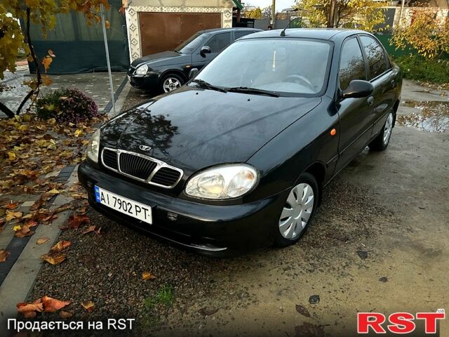 Черный Дэу Ланос, объемом двигателя 1.4 л и пробегом 220 тыс. км за 1800 $, фото 9 на Automoto.ua