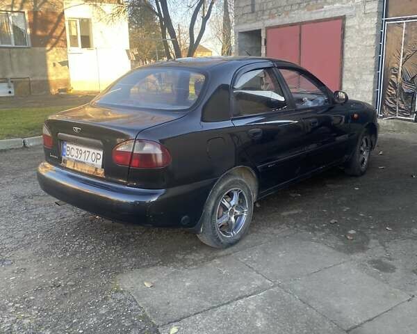 Черный Дэу Ланос, объемом двигателя 1.5 л и пробегом 204 тыс. км за 2350 $, фото 2 на Automoto.ua
