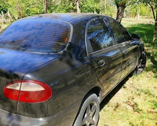 Черный Дэу Ланос, объемом двигателя 1.5 л и пробегом 350 тыс. км за 2500 $, фото 16 на Automoto.ua