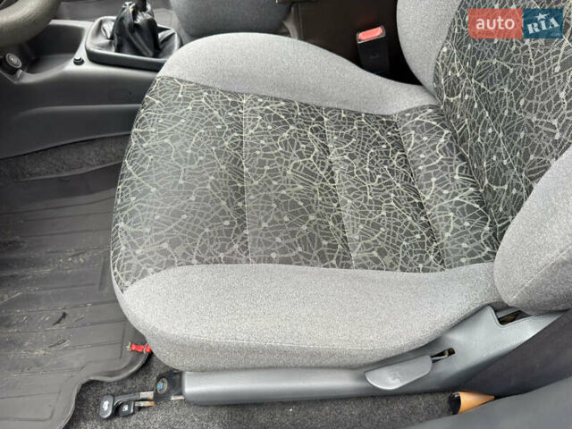 Черный Дэу Ланос, объемом двигателя 1.6 л и пробегом 156 тыс. км за 2400 $, фото 24 на Automoto.ua