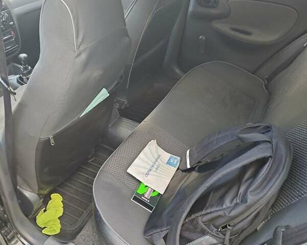 Деу Ланос 2008 у Запоріжжя на Automoto.ua Чорний Деу Ланос, об'ємом двигуна 1.5 л та пробігом 187 тис. км за 2350 $, фото 13 на Automoto.ua