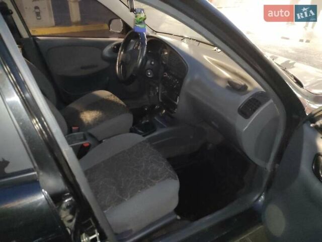 Чорний Деу Ланос, об'ємом двигуна 1.5 л та пробігом 147 тис. км за 2350 $, фото 10 на Automoto.ua