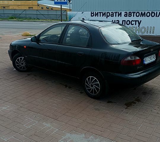 Черный Дэу Ланос, объемом двигателя 1.5 л и пробегом 194 тыс. км за 2000 $, фото 5 на Automoto.ua